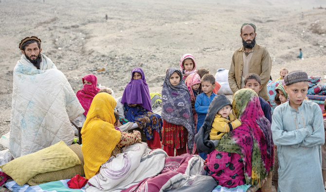Afghan refugees settle in a camp near the Torkham Pakistan-Afghanistan border in Torkham, Afghanistan, Saturday, Nov. 4, 2023. A huge number of Afghans refugees entered the Torkham border to return home hours before the expiration of a Pakistani government deadline for those who are in the country illegally to leave or face deportation. (AP Photo/Ebrahim Noroozi)