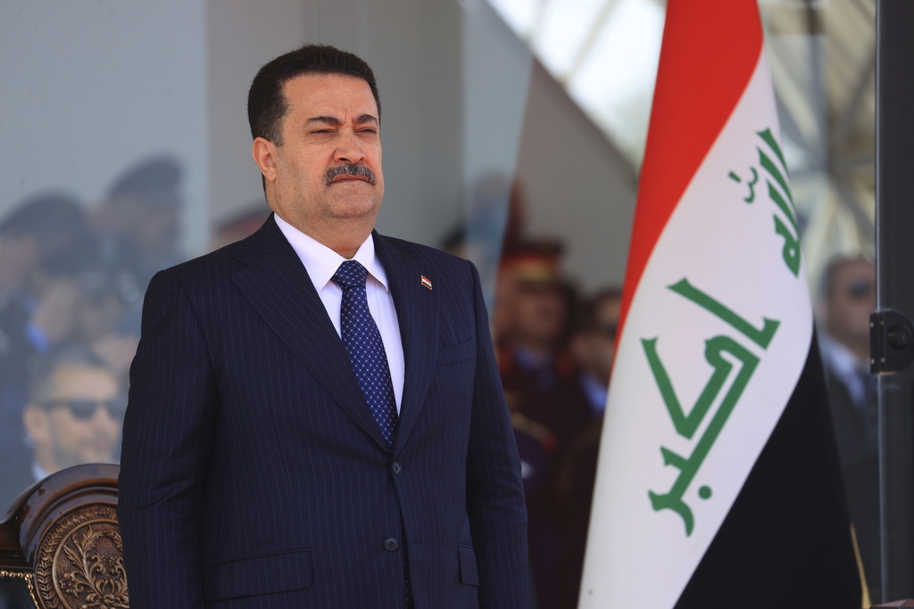Iraq's Prime Minister Mohammed Shia al-Sudani attends a ceremony marking the Police Day in Baghdad, Iraq, Tuesday, Jan. 9, 2024. (Murtadha Al-Sudani//Pool Photo via AP)