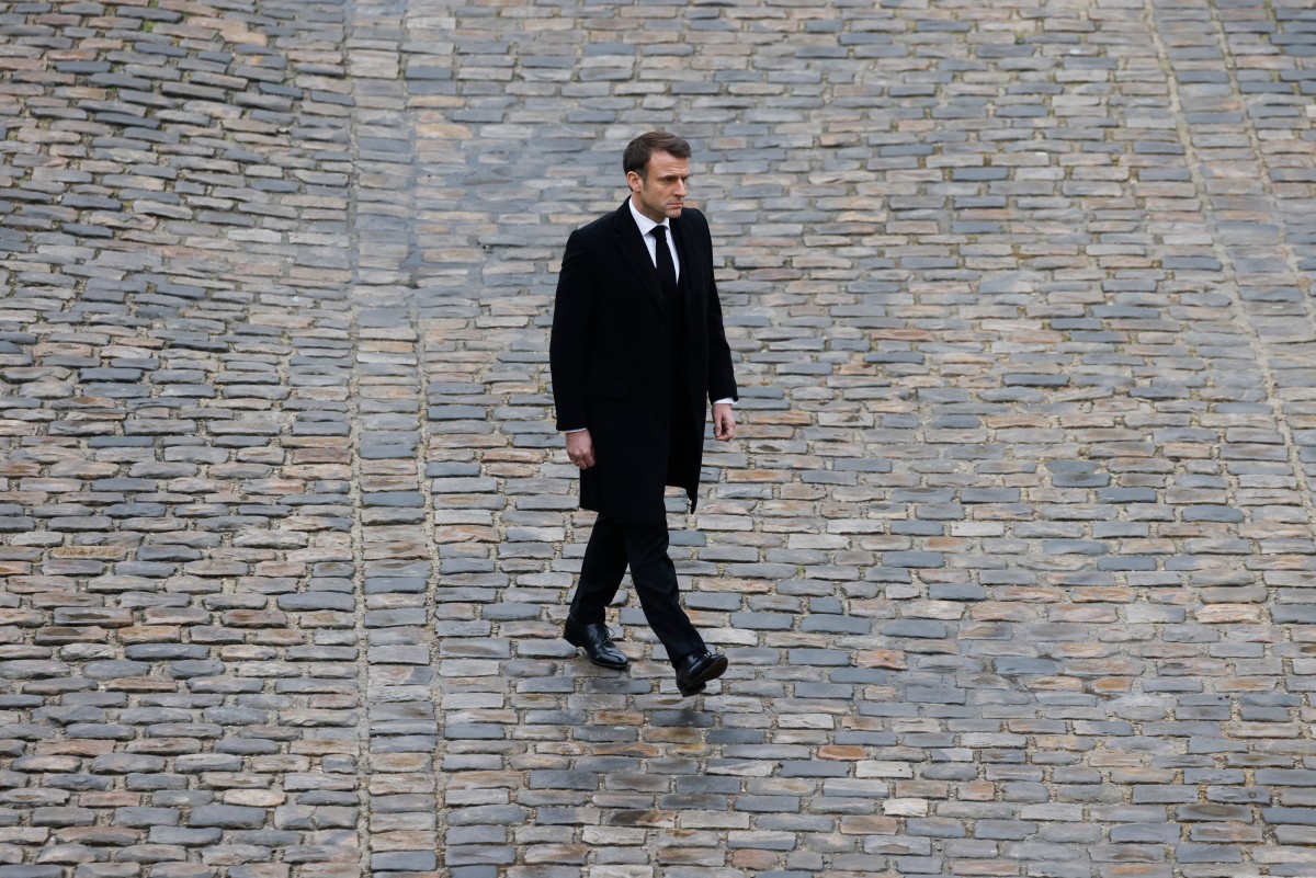 French President Emmanuel Macron arrives to host a ceremony to pay tribute to the French victims of the attack by Hamas against Israel on October 7, at the Invalides memorial complex in Paris, on February 7, 2024. Photo: AFP