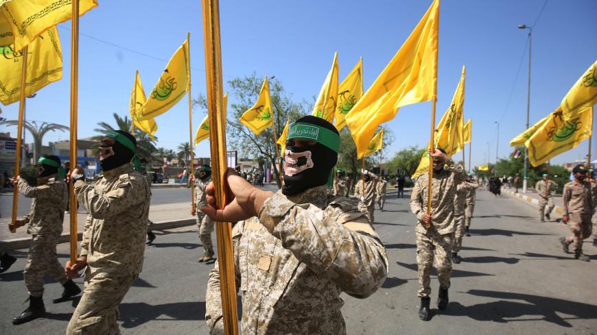 Iraqi Shiite fighters from Harakat Hezbollah al-Nujaba march during a military parade marking Al-Quds (Jerusalem) International Day in Baghdad, May 31, 2019. - AHMAD AL-RUBAYE/AFP via Getty Images


Read more: https://www.al-monitor.com/originals/2020/01/iraq-iran-pmu-nujaba-muqtada.html#ixzz8cdQTk9MJ