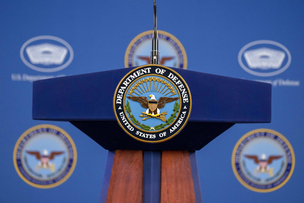 The Department of Defense Seal is seen on the podium before Pentagon spokesman U.S. Air Force Brig. Gen. Patrick Ryder speaks during a media briefing at the Pentagon, Friday, Feb. 24, 2023, in Washington. (AP Photo/Alex Brandon)