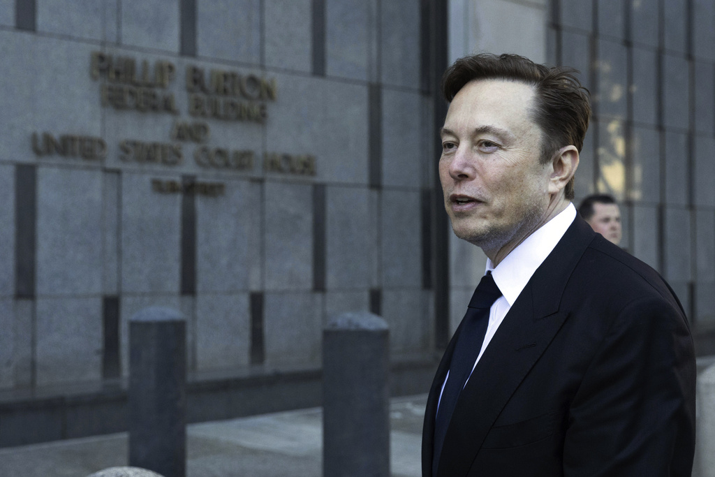 FILE - Elon Musk leaves the Phillip Burton Federal Building in San Francisco (AP Photo/Benjamin Fanjoy, File)