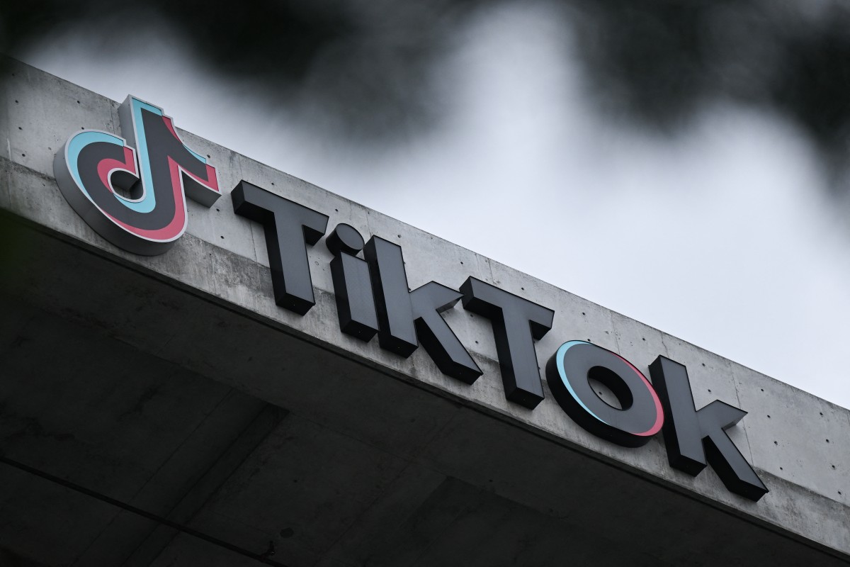 The TikTok logo is displayed outside the offices of the social media app's company offices in Culver City, California, on March 16, 2023. The US Supreme Court is to hear TikTok's appeal on January 10, 2025 of a law that would force its Chinese owner to sell the wildly popular online video-sharing platform or shut it down. (Photo by Patrick T. Fallon / AFP)