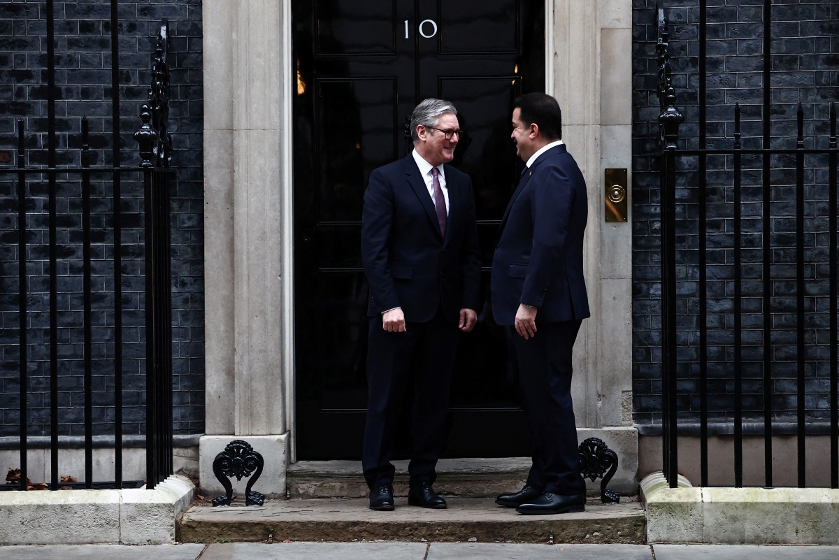 Britain's Prime Minister Keir Starmer (L) welcomes Iraq’s Prime Minister Mohammed Shia al-Sudani at 10 Downing Street, in central London, on January 14, 2025 ahead of their meeting. Photo: Henry Nicholls / AFP
