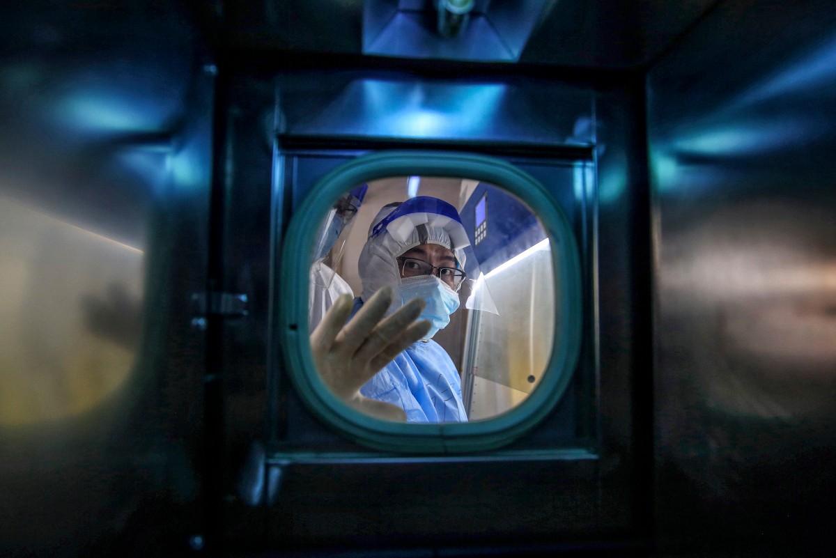 On January 23, 2020, with the then unknown virus spreading, Wuhan sealed itself off for 76 days, ushering in China's zero-Covid era of strict travel and health controls and foreshadowing the global disruption yet to come. (Photo by AFP) 
