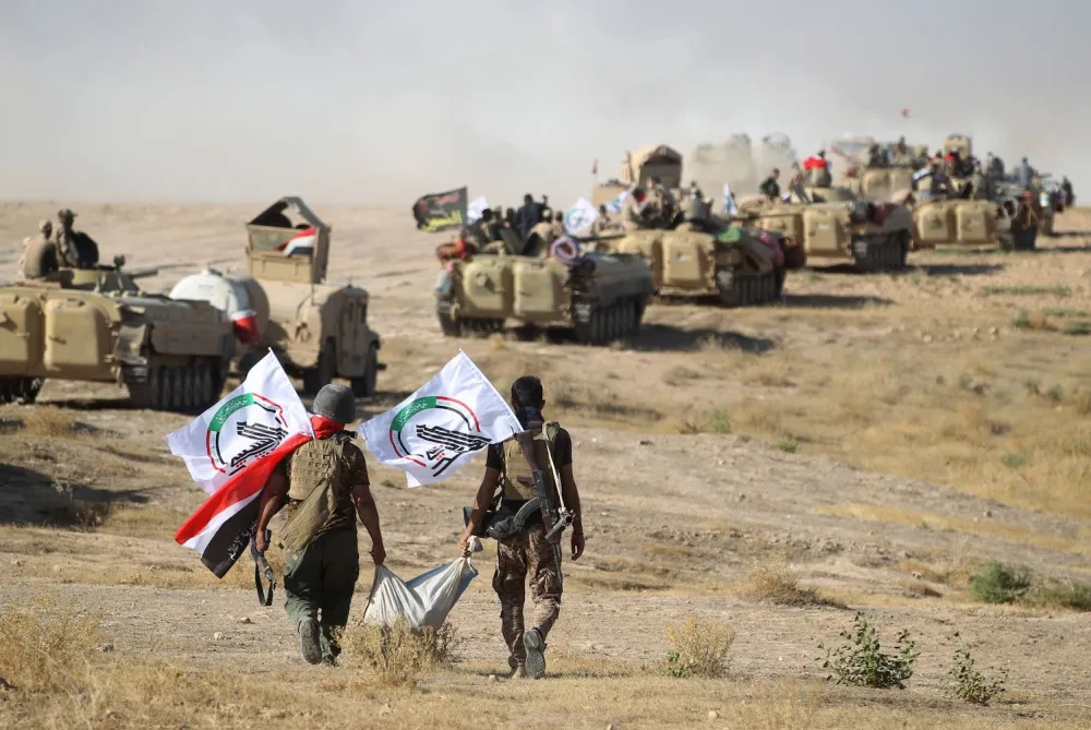 Members of the Popular Mobilization Forces. Photo: AFP / Ahmad Al-Rubaye