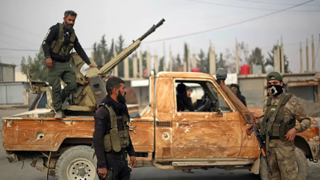 Turkish-Backed Syrian National Army Fighters Patrol Manbij, Aleppo on January 4, 2025. Photo: AFP / Aaref Watad