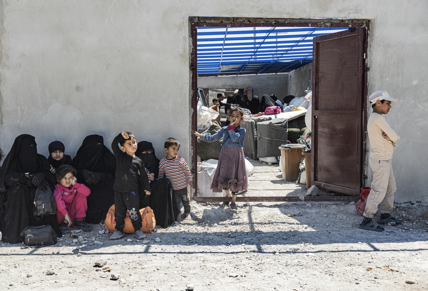 Family members of suspected ISIS fighters await transfer by Syrian Democratic Forces from Al-Hol camp in Al-Hasakah, May 8, 2024. Photo: AP / Baderkhan Ahmad