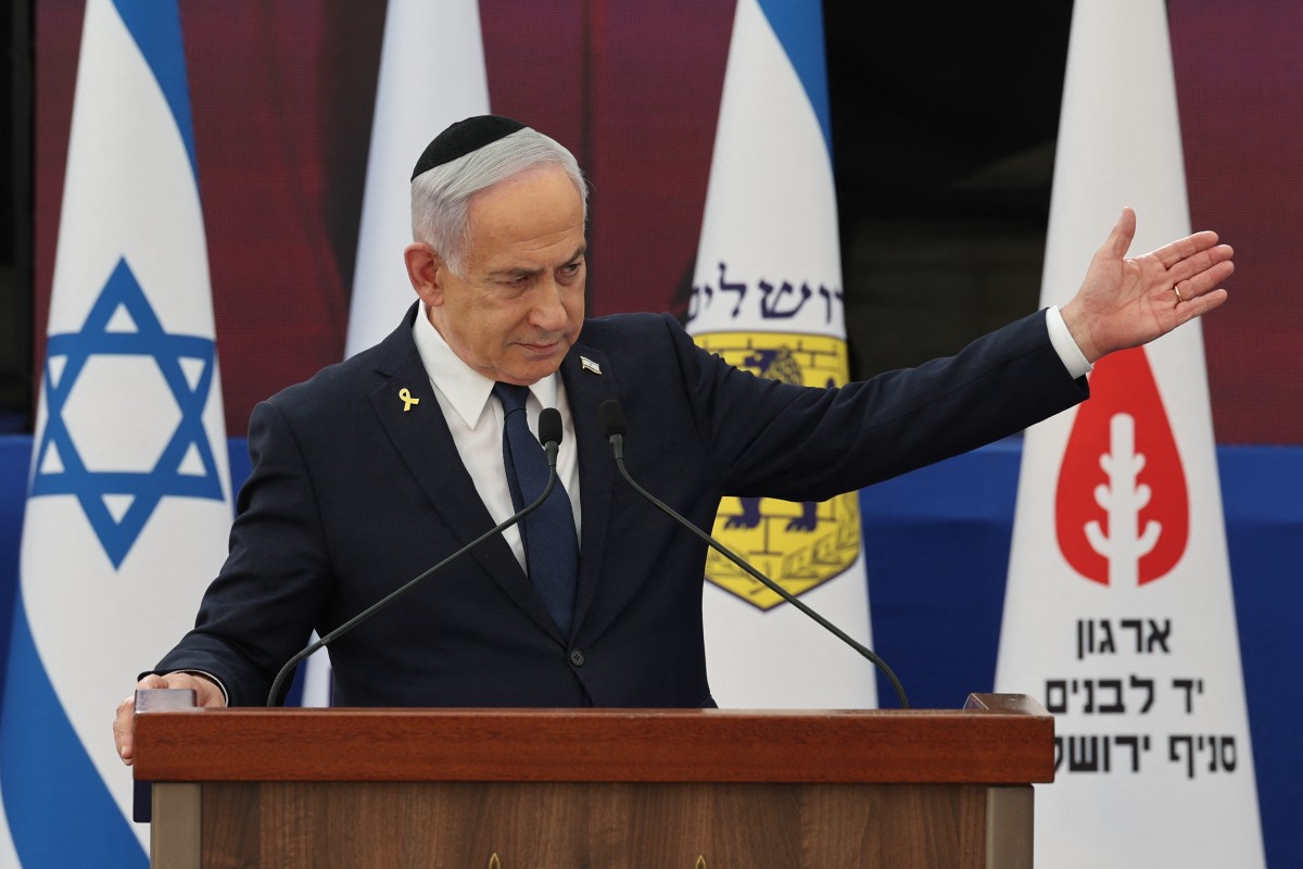 Israeli Prime Minister Benjamin Netanyahu speaks during the annual ceremony at the eve of Israels Remembrance Day for fallen soldiers (Yom HaZikaron) at the Yad LaBanim Memorial in Jerusalem, on April 29, 2025. (Photo by Abir SULTAN / POOL / AFP)