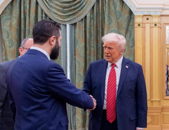 U.S. President Donald Trump shakes hands with Syria’s interim president Ahmed al-Sharaa in Riyadh on May 14, 2025. Photo: Bandar aL-Jaloud / Saudi Royal Palace / AFP