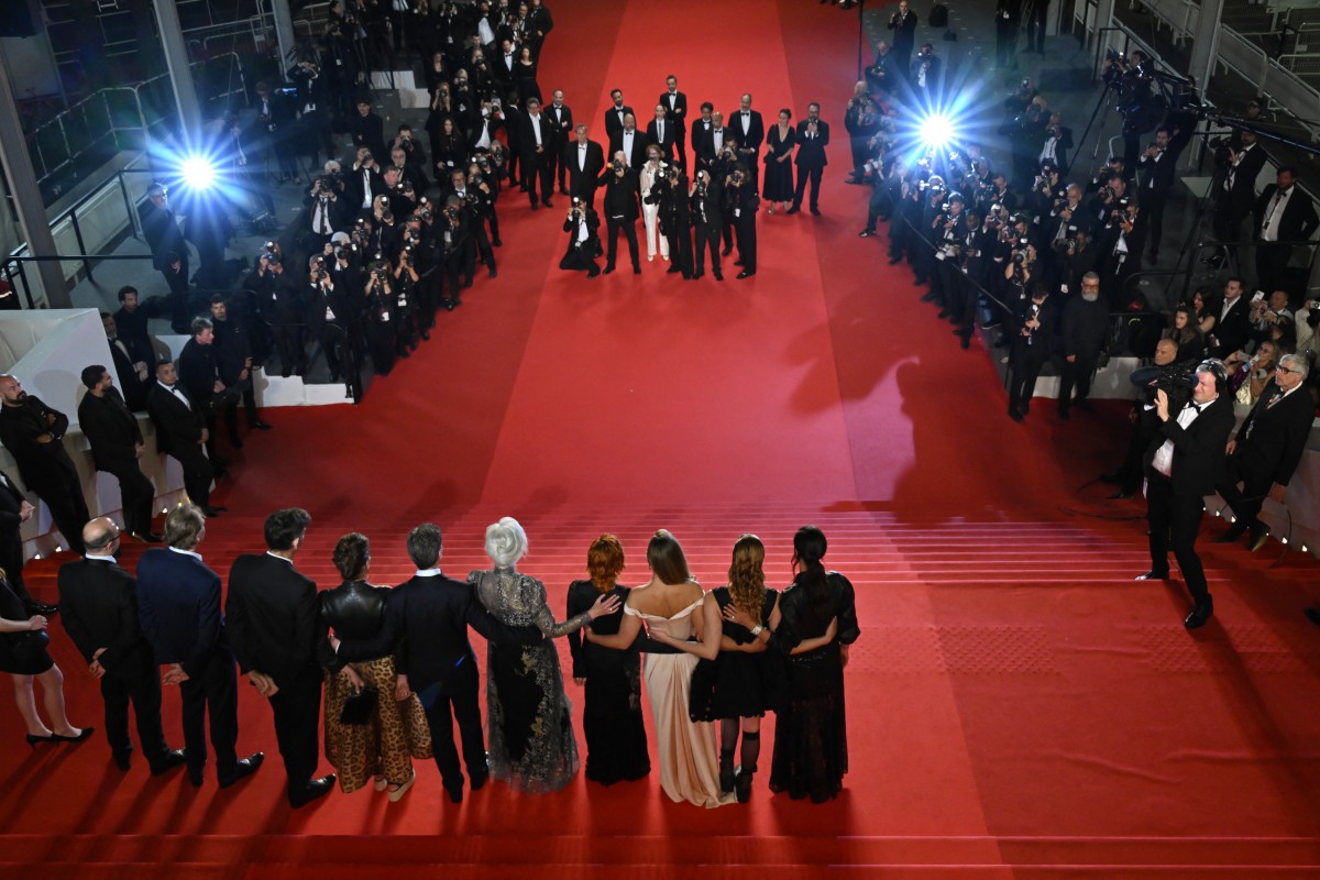Cast members arrive for the screening of the film "Dalloway" at the 78th edition of the Cannes Film Festival in Cannes, southern France, on May 15, 2025. (Photo by Antonin THUILLIER / AFP)