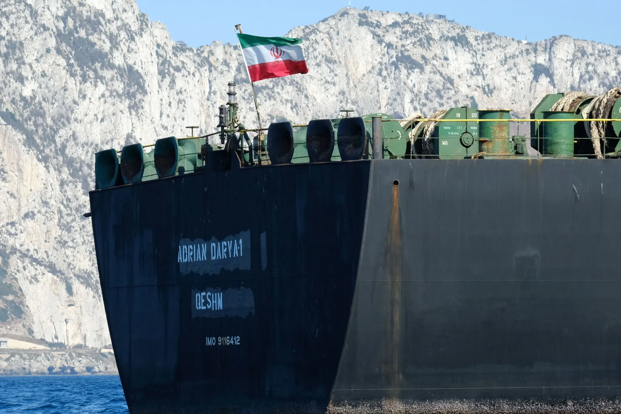 An Iranian flag on board the Adrian Darya oil tanker. Photo: Johnny Bugeja / AFP

