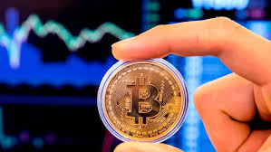 A visual representation of Bitcoin, at the 'Bitcoin Change' shop in Tel Aviv, February 6, 2018. (Jack Guez/AFP)
