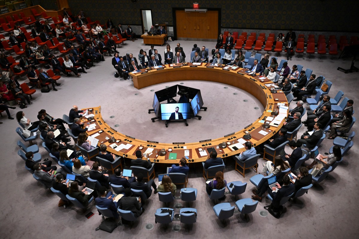 Palestinian Ambassador to the United Nations Riyad Mansour (L) speaks during a United Nations Security Council meeting on the conflict in the Middle East, including the Palestinian question, at United Nations headquarters on August 5, 2025 in New York. (Photo by ANGELA WEISS / AFP)