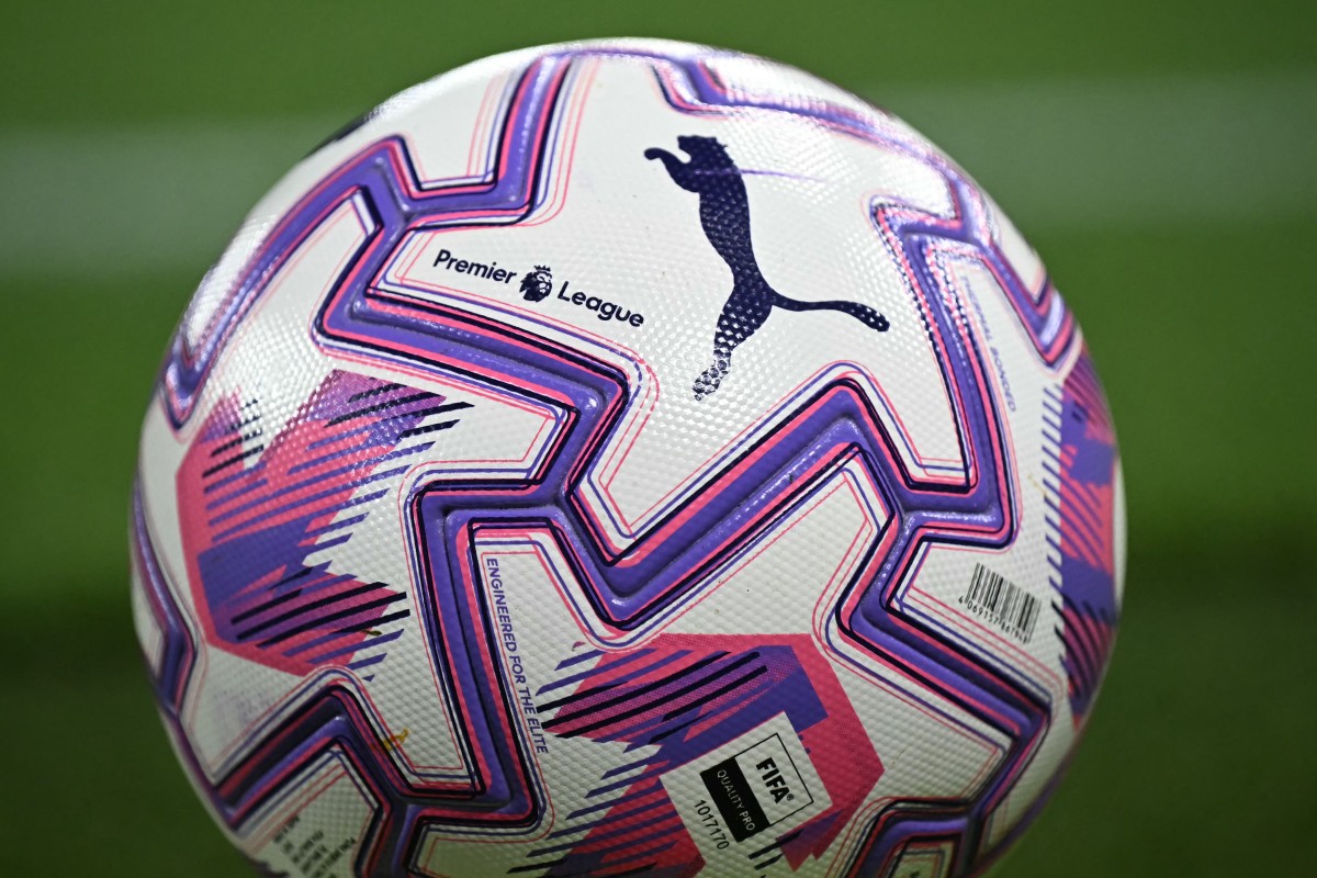 The new Puma Orbita Ultimate PL football is seen pitch-side during the English Premier League football match between Liverpool and Bournemouth at Anfield in Liverpool, north west England on August 15, 2025. (Photo by Paul ELLIS / AFP)  