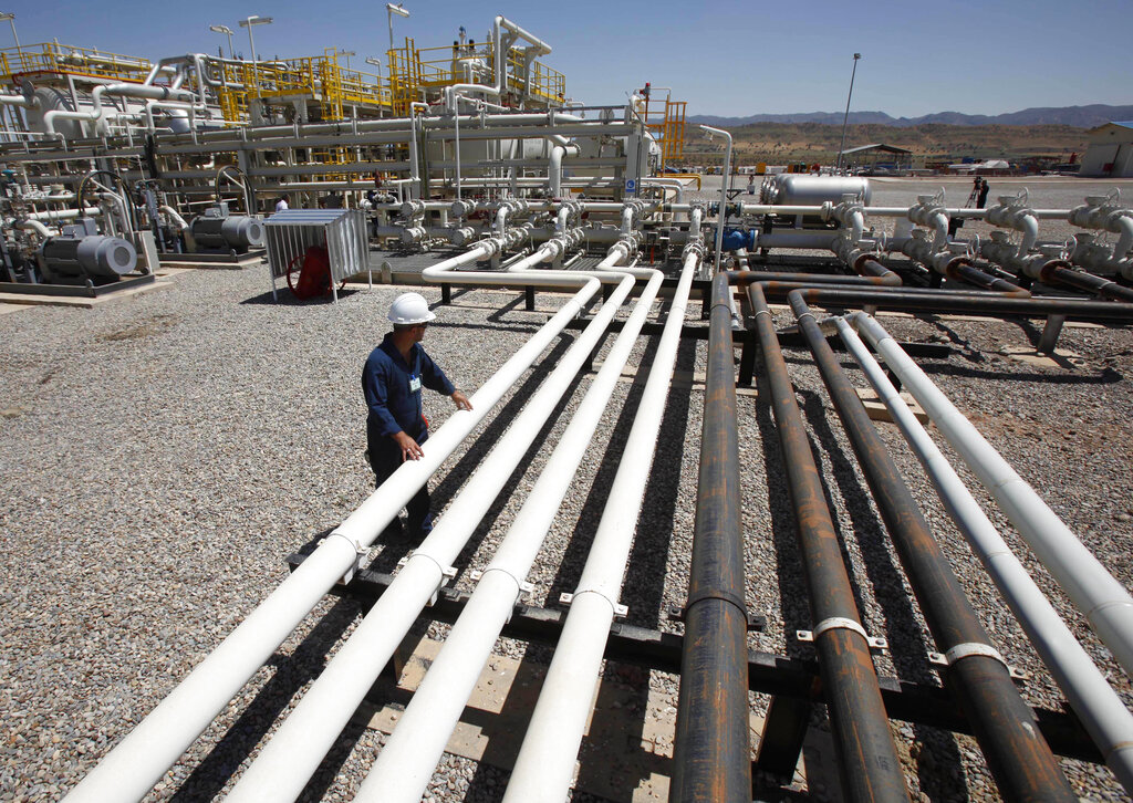 A worker is on duty at the Tawke oil fields in the Kurdistan Region. Photo: Hadi Mizban / AP