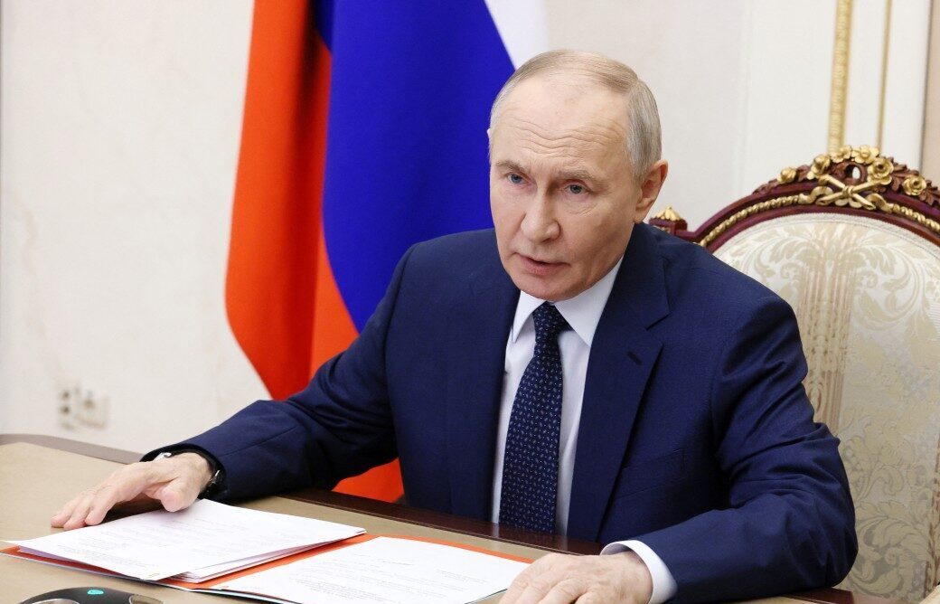 Russian President Vladimir Putin chairs a Security Council meeting via videolink in Moscow on December 26, 2025. Photo: Mikhail Metzel / POOL / AFP




