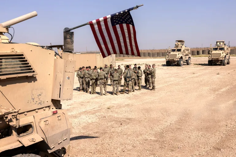 U.S. Army soldiers prepare to go out on patrol from a remote combat outpost. (Photo by JOHN MOORE / GETTY IMAGES NORTH AMERICA / Getty Images via AFP)