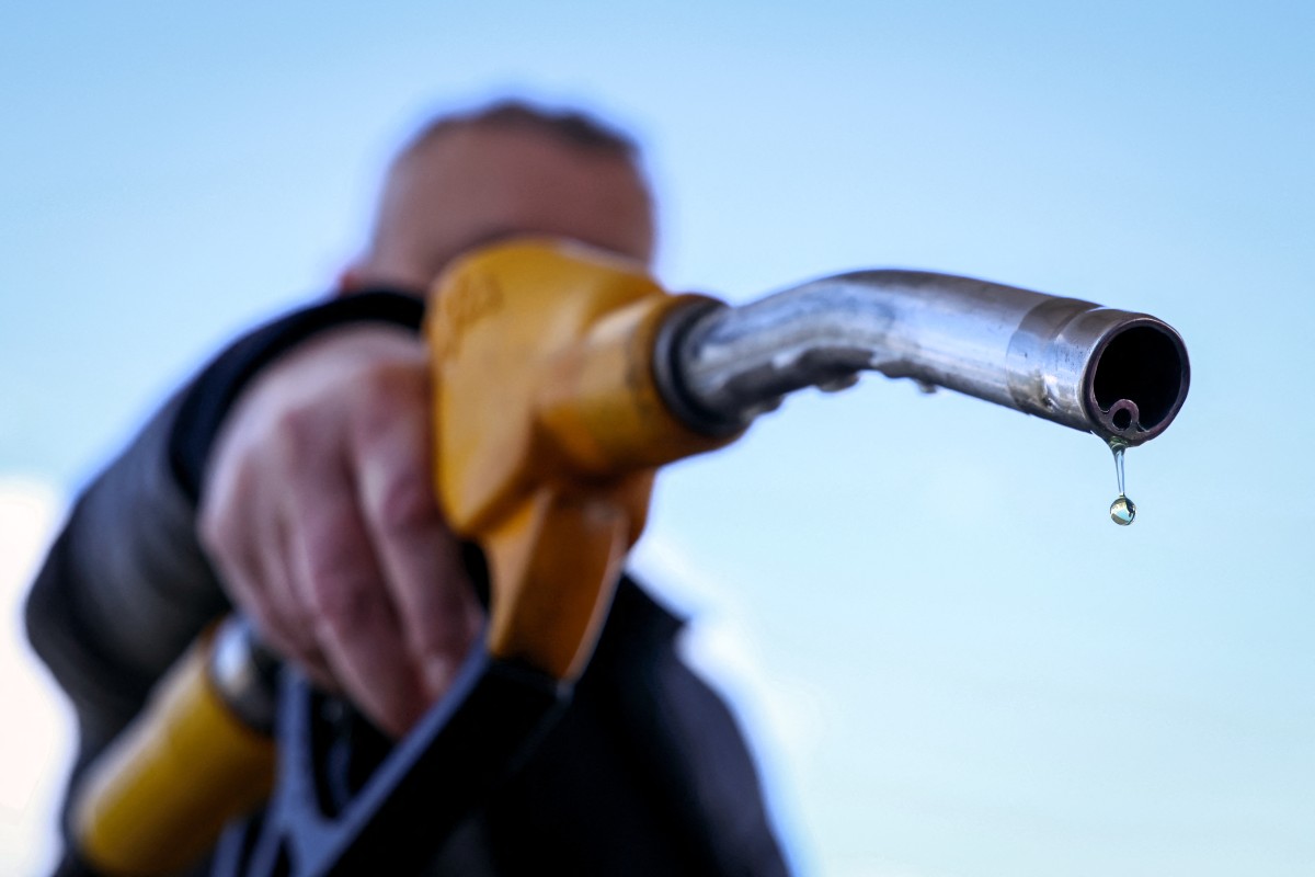 A drop of petrol falls from the nozzle of a petrol pump at a petrol station in Vélizy-Villacoublay, near Paris, on March 9, 2026.
