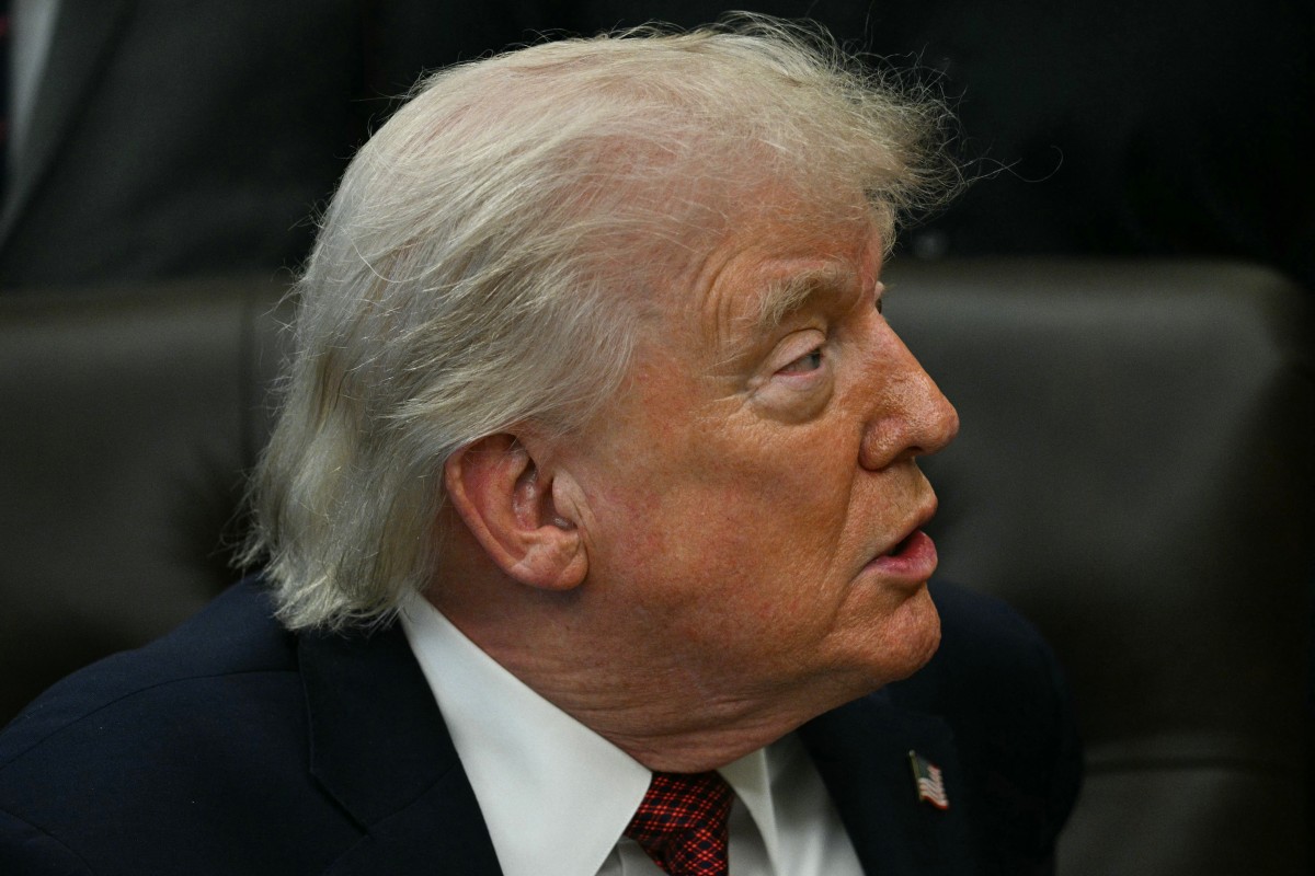 U.S. President Donald Trump speaks after signing an executive order in the Oval Office of the White House in Washington, DC on April 18, 2026. Photo: Jim Watson / AFP





