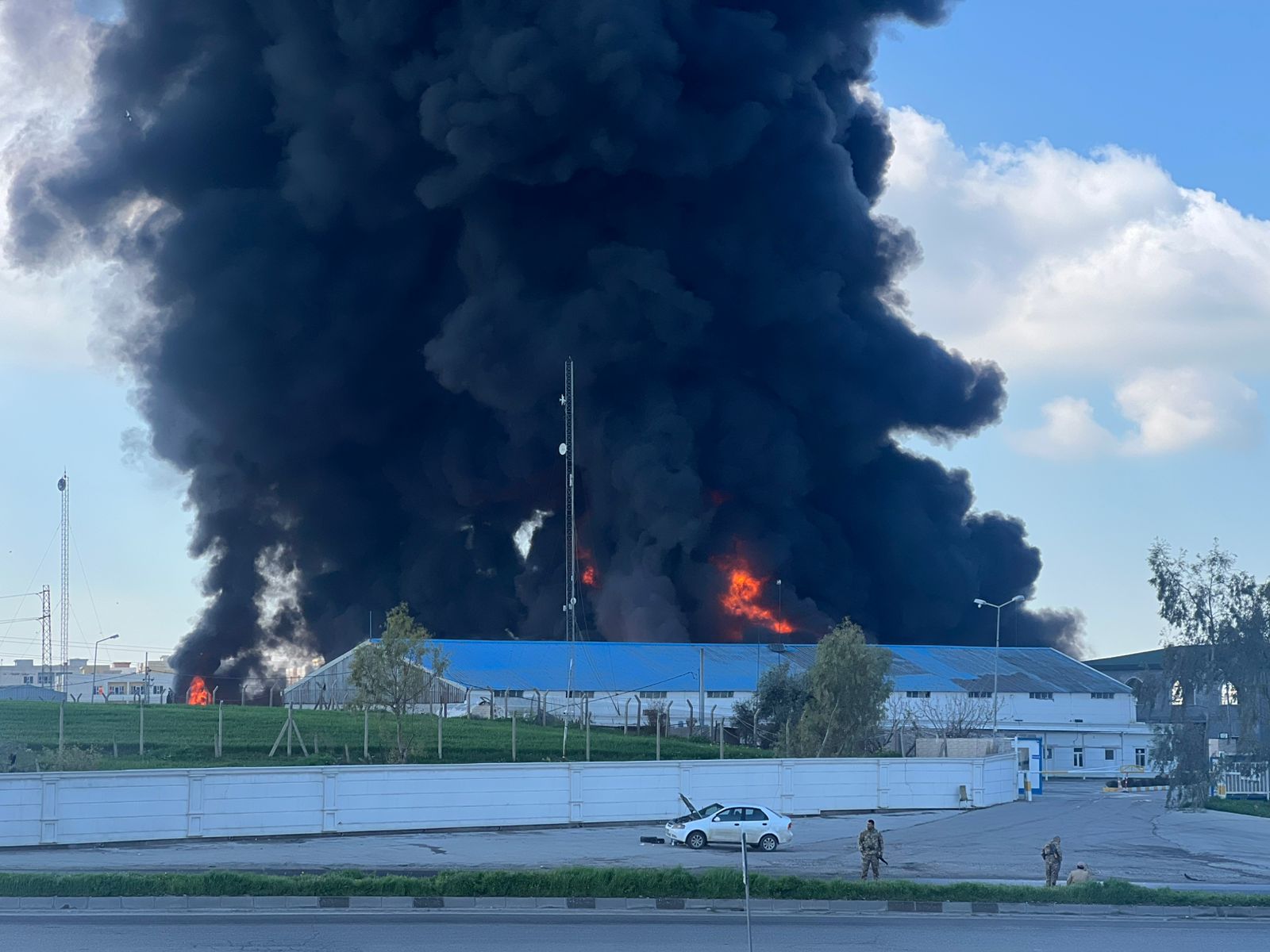             A scene of rising smoke and fire from drone attacks on an automotive oil factory in Erbil on April 1, 2026. Photo: Ayub Warte / Channel8