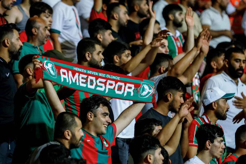 Amedspor’s fans cheer in the stands during the Trendyol League football match between Amedspor and Sakaryaspor at Necmi Kadooglu stadium in Esenyurt district of Istanbul. Photo: AFP