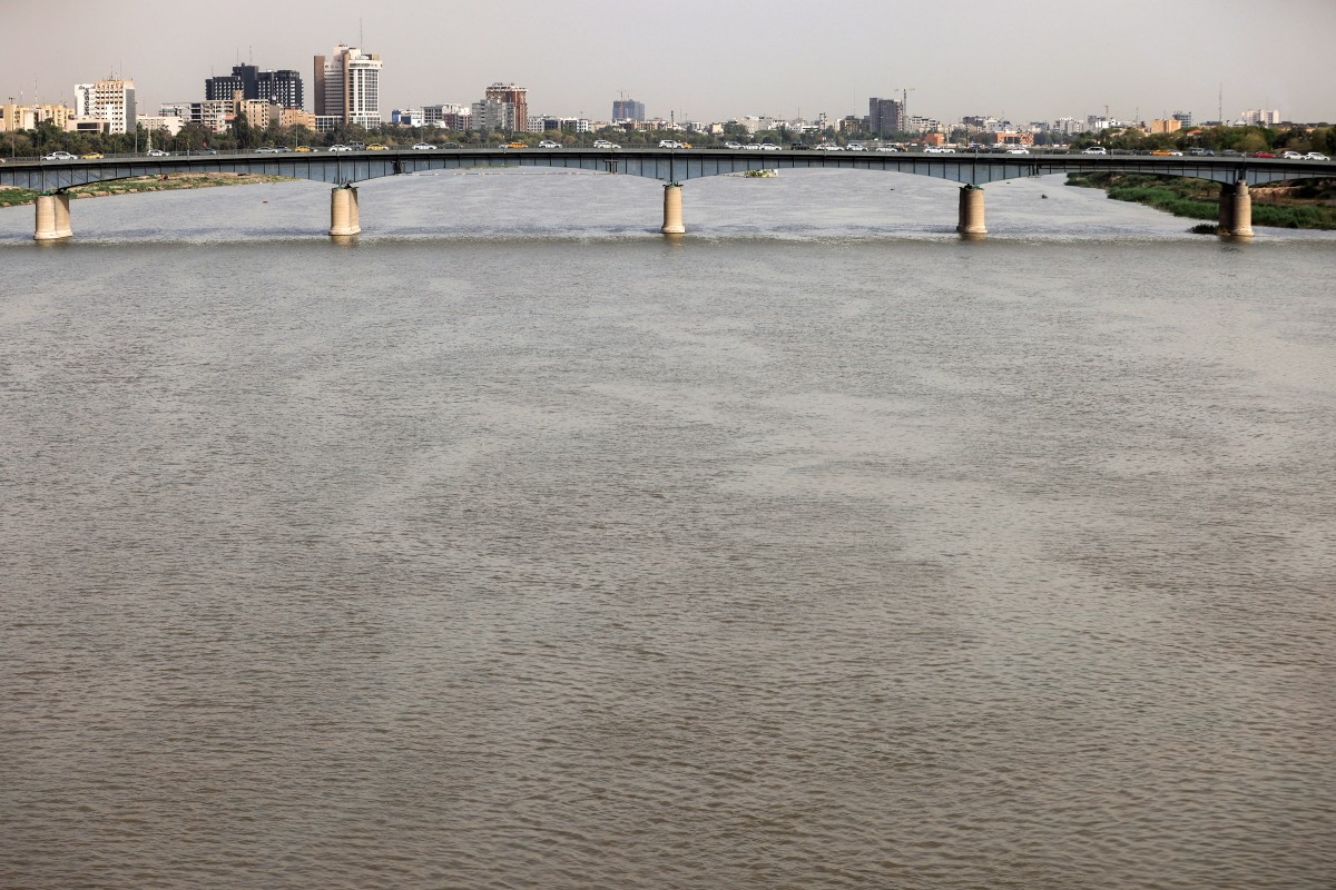 The Tigris river is pictured in central Baghdad on May 4, 2026. The Tigris' water levels have risen due to the rains and floods that have swept across Iraq this winter after years of drought caused by low rainfall. Iraq's water ministry said the reservoirs along the river are almost full, adding that it expects water levels in the Euphrates to rise in the coming days if Syria releases water from its dams. (Photo by AHMAD AL-RUBAYE / AFP)