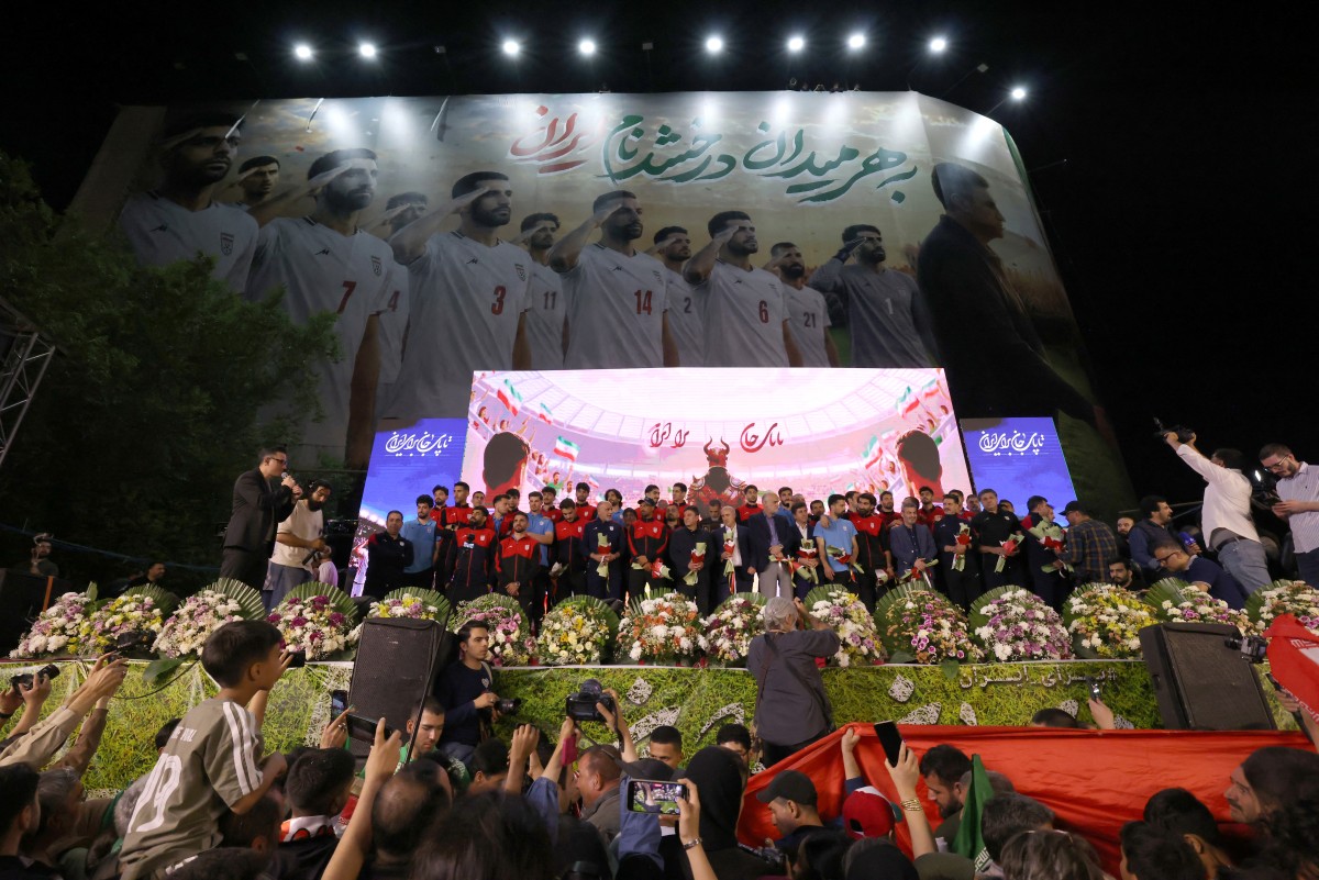 Members of Iran's national football team attend a farewell ceremony ahead of their departure for the 2026 FIFA World Cup, in Tehran on May 13, 2026. 