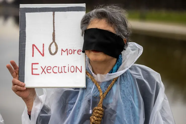 Iranian members of the diaspora and activists gather at the Lincoln Memorial in the National Mall, Washington D.C., during the 'United Against Executions in Iran' protest on Jan. 27, 2024.Ali Khaligh–Middle East Images/AFP/Getty Images
