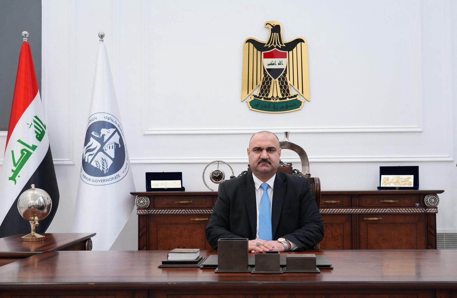 Kirkuk Governor and Iraqi Turkmen Front leader Mohammed Samaan Agha poses at his desk at the provincial headquarters in Kirkuk, Iraq. Photograph released by the Governor's Media Office.