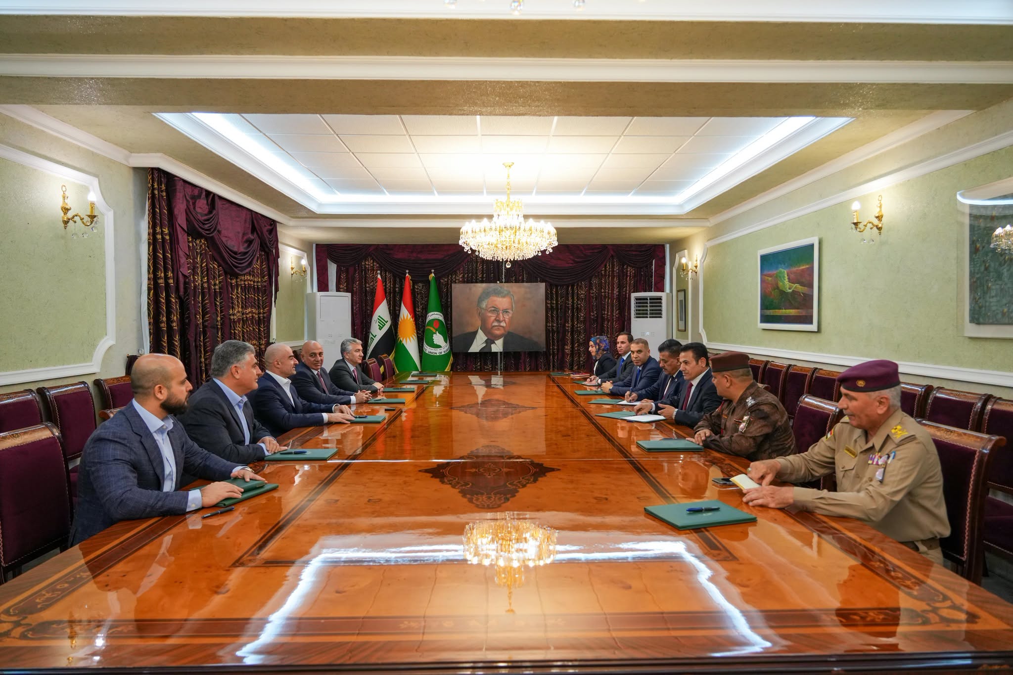 Patriotic Union of Kurdistan (PUK) President Bafel Jalal Talabani (left, second from front) hosts a high-level security delegation led by Iraqi National Security Advisor Qasim al-Araji (right, third from front)   in Dabashan, Sulaymaniyah.