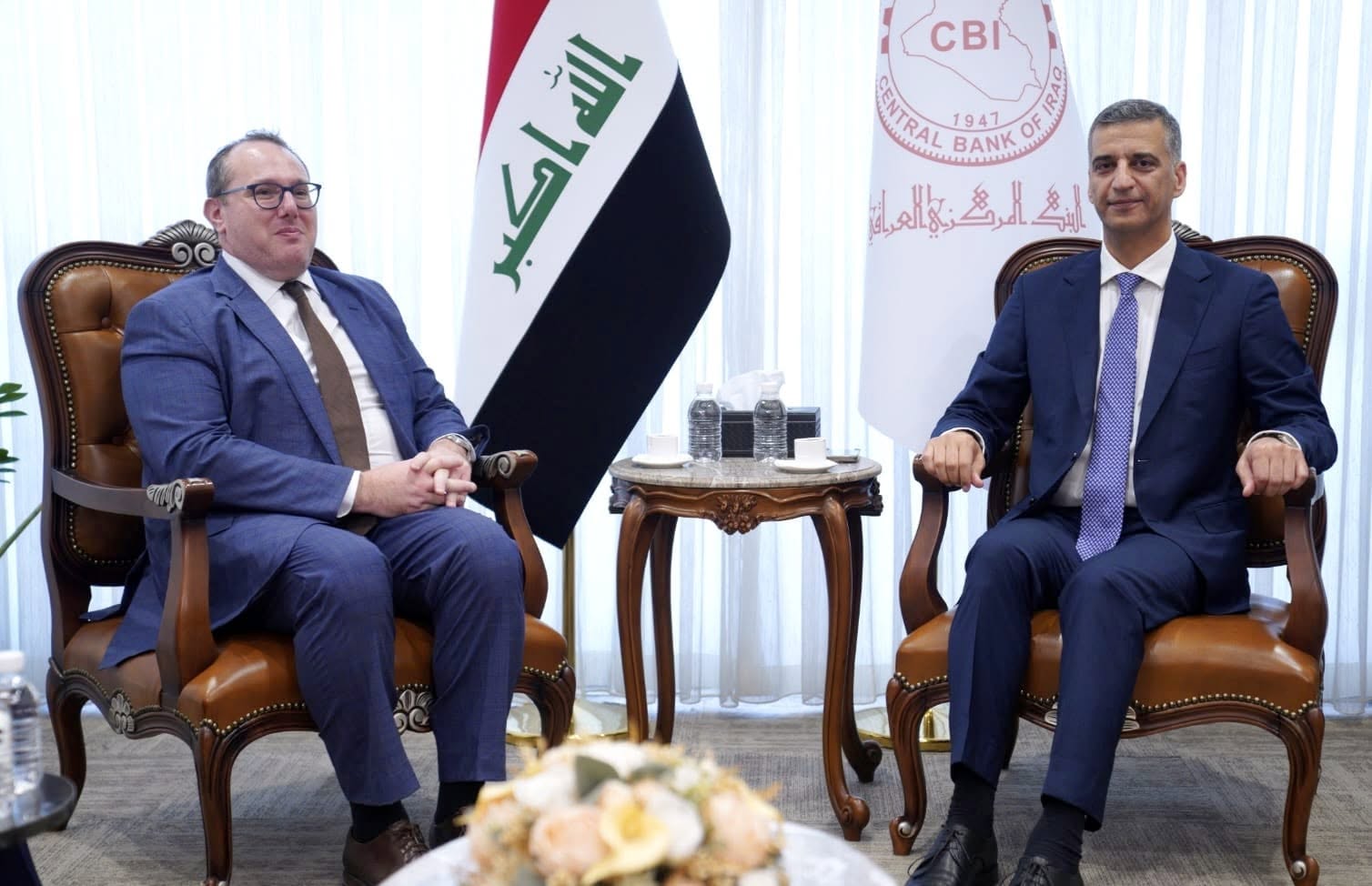 The Governor of the Central Bank of Iraq (CBI), Nizar Nasser Hussein (right), meets with the Chargé d'Affaires of the United States Embassy in Iraq, Joshua Harris (left), to discuss bilateral financial relations and economic developments.