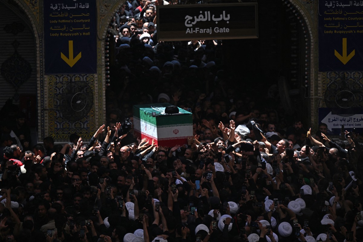 Mourners carry the coffin of Iran's slain supreme leader Ali Khamenei at the Imam Ali shrine in Najaf on July 8, 2026. Photo: Hussein Faleh / AFP

