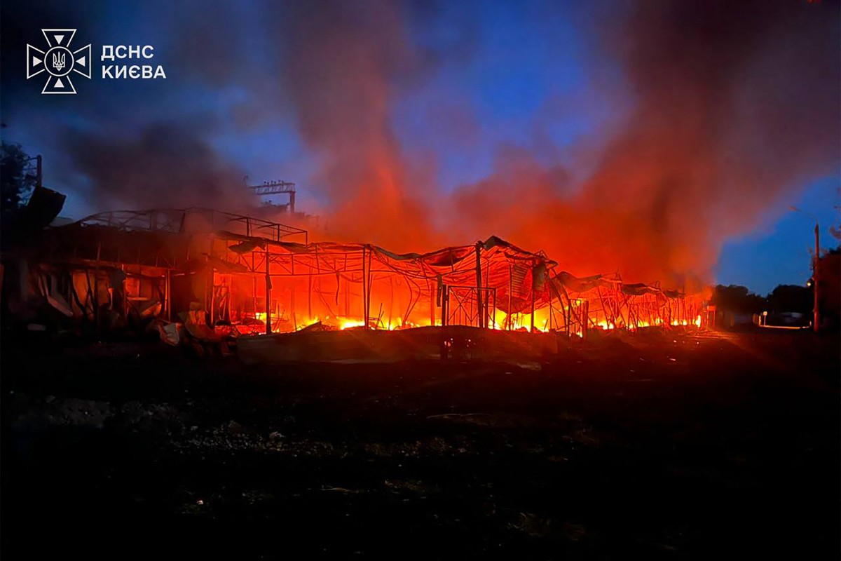 This handout photograph taken and released by Ukrainian State Emergency Service on July 30, 2026 shows a structure on fire following Russian strikes on the Ukrainian capital of Kyiv, amid the Russian invasion in Ukraine. (Photo by Handout / Ukrainian State Emergency Service / AFP)