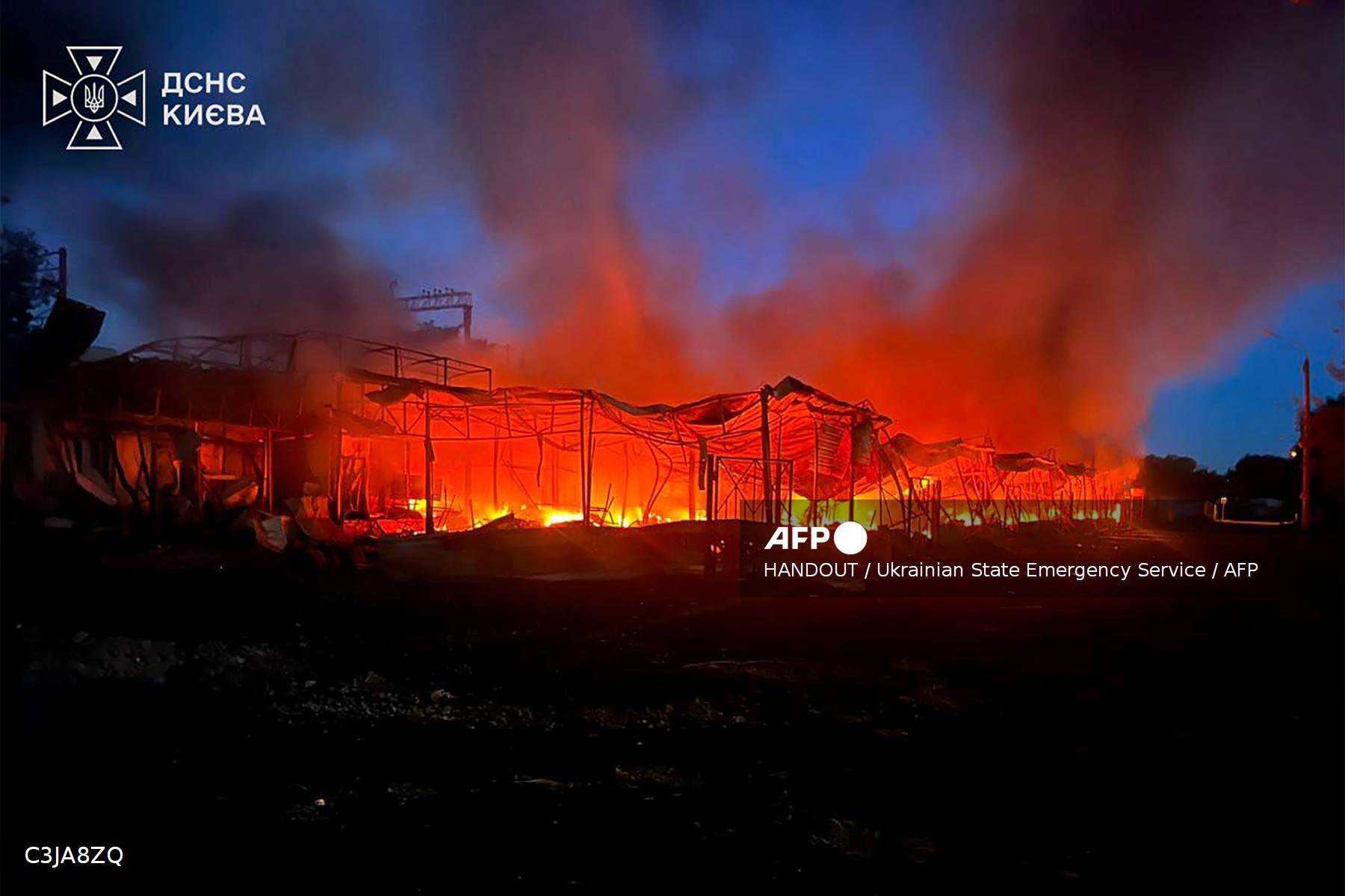 This handout photograph taken and released by Ukrainian State Emergency Service on July 30, 2026 shows a structure on fire following Russian strikes on the Ukrainian capital of Kyiv, amid the Russian invasion in Ukraine. (Photo by Handout / Ukrainian State Emergency Service / AFP)