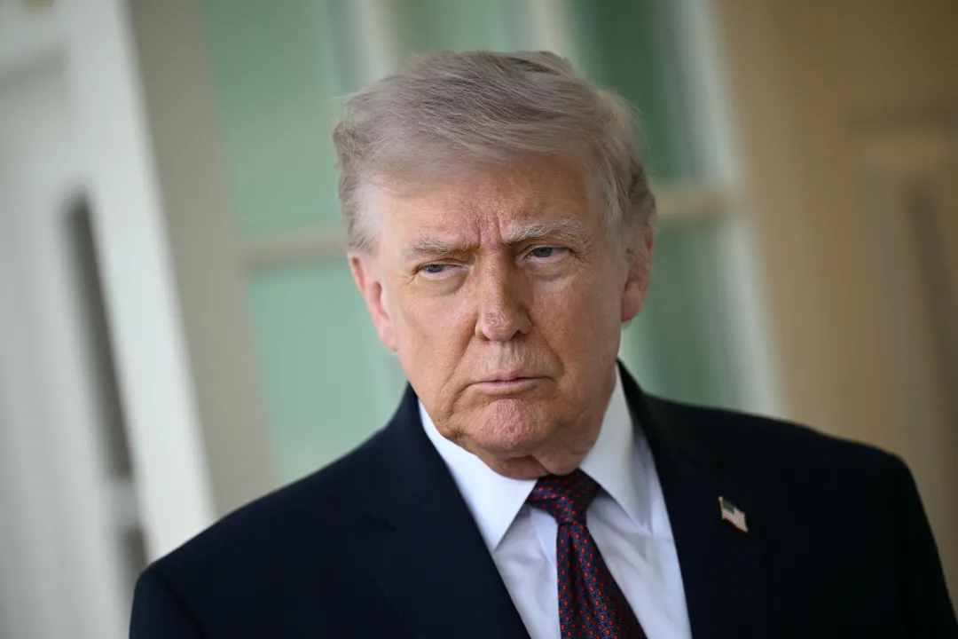 U.S. President Donald Trump speaks to the press outside the Oval Office at the White House in Washington, DC, on April 13, 2026. Photo: Brendan Smialowski / AFP via Getty Images

