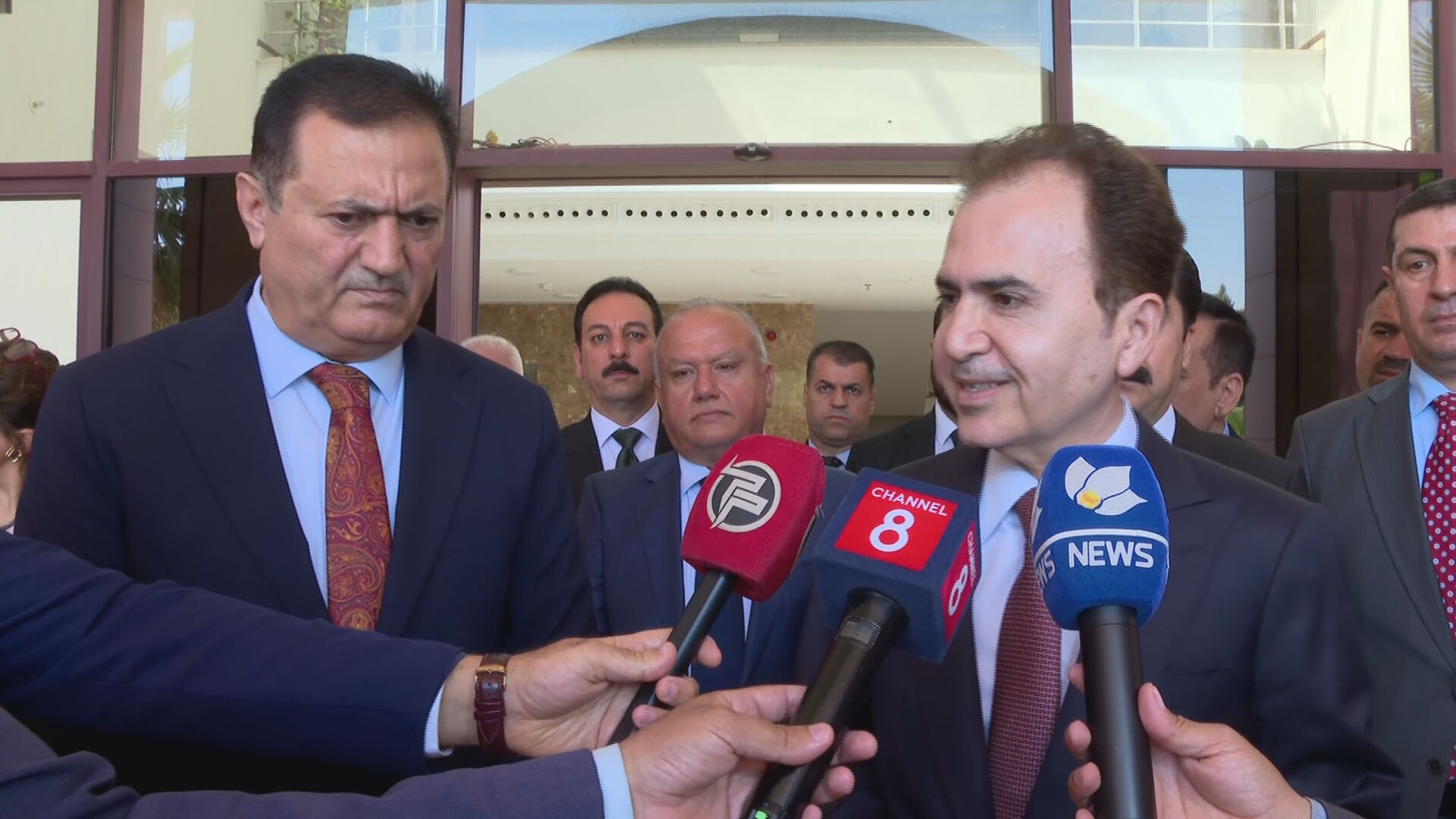 Pshtiwan Sadiq, Political Bureau Member and Head of the KDP Organizing Bureau, and Rebaz Birkoti, Member of the PUK Leadership Council, speak to reporters on July 26, 2026. Photo: Channel8


