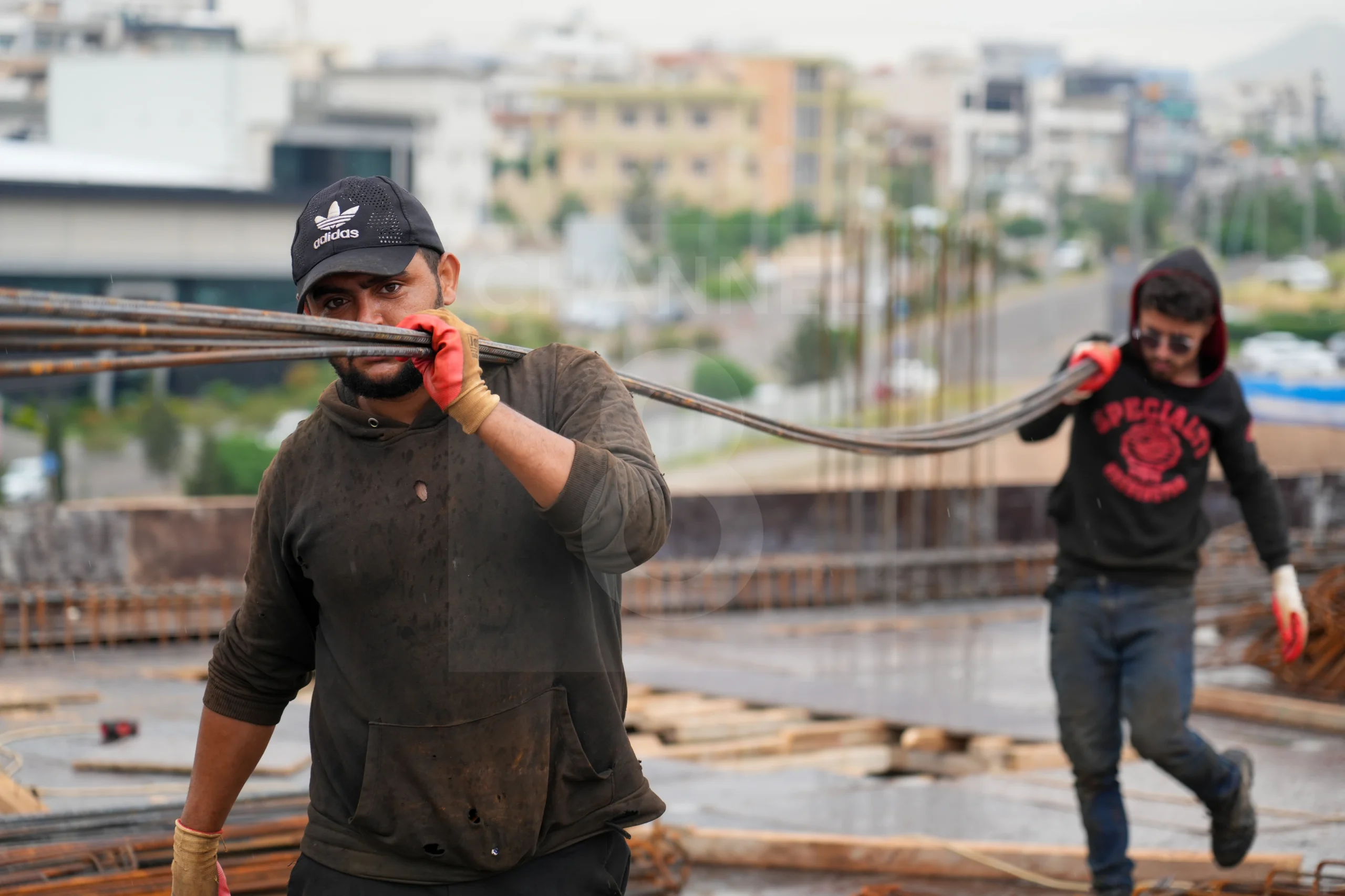 Two construction workers working on International Workers' Day, 1 May 2026. Photo: Hama Sur / Channel8


