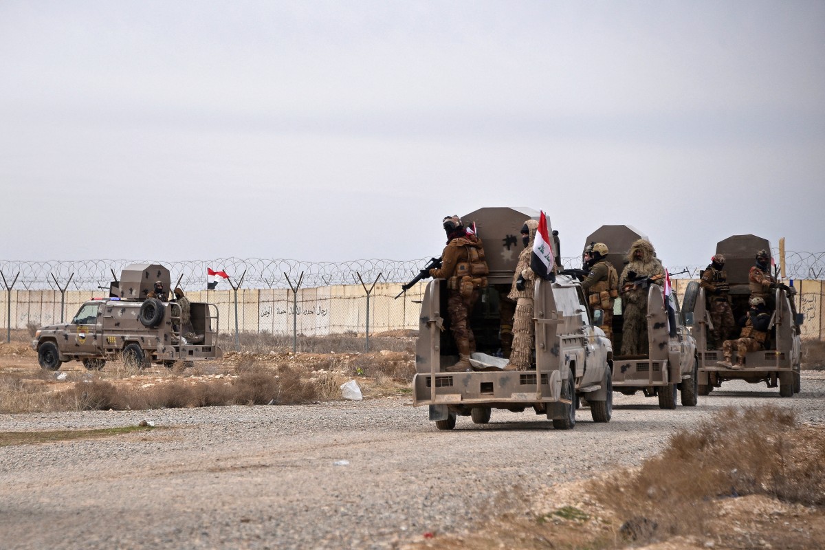 Iraqi border security force personnel patrol in their armoured vehicles along the border with Syria, in Sinjar district, northern Iraq on January 22, 2026, following recent situation in Syria. Photo: AFP 