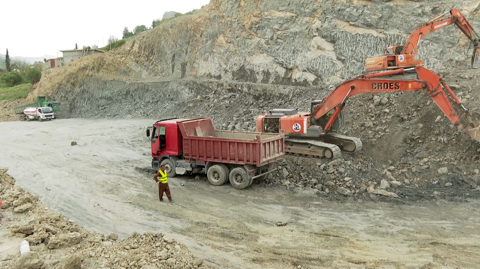 A scene from the ongoing construction work on the Kunamasi-Qaladiza road