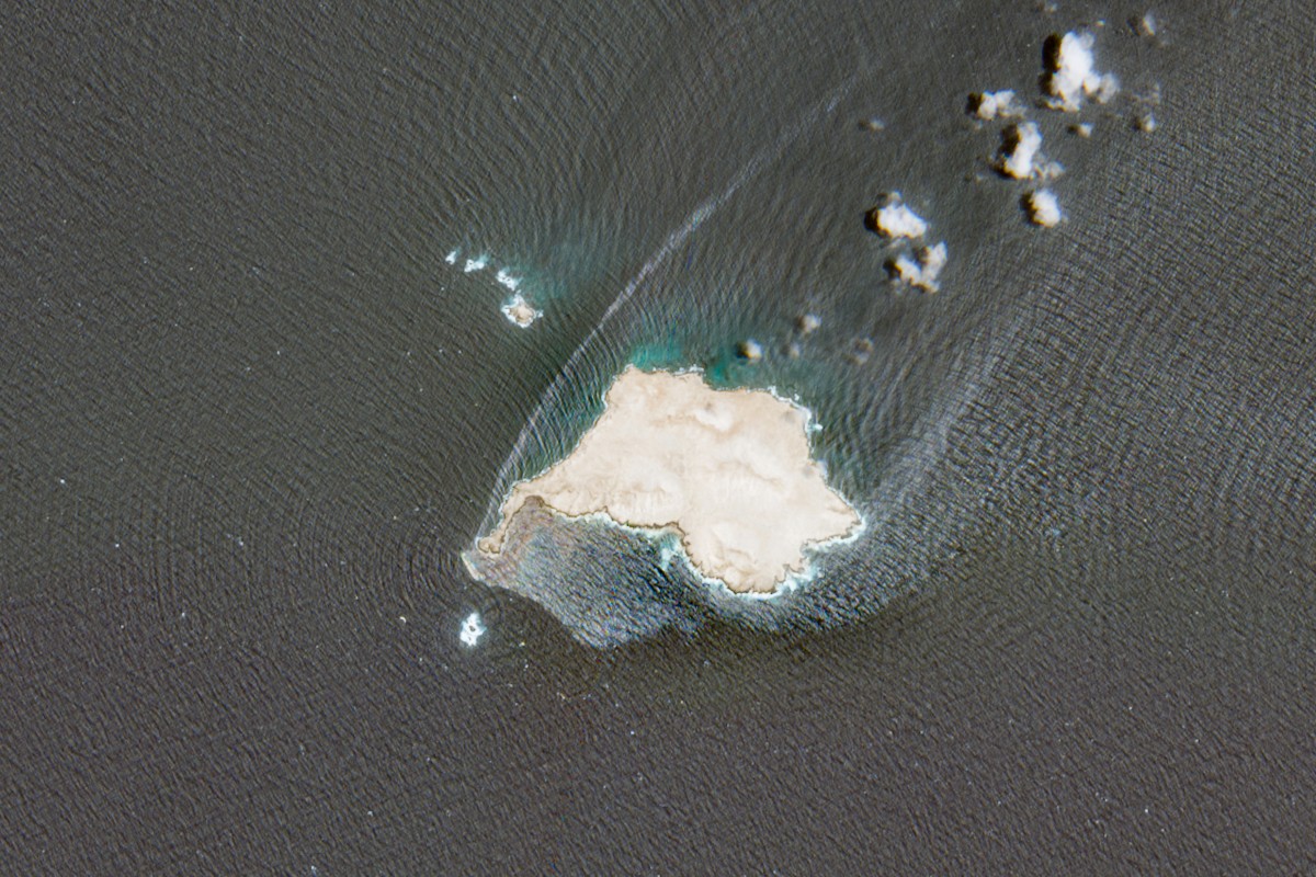 This satellite image obtained from Copernicus Sentinel Data 2026 on August 4, 2026 and taken on July 28 shows a slick that is consistent with an oil leak emanating from a ship, stranded for over a month near Qibliyyah island off Oman's southern coast in the Arabian Sea. (Photo by COPERNICUS SENTINEL DATA 2026 / AFP) 