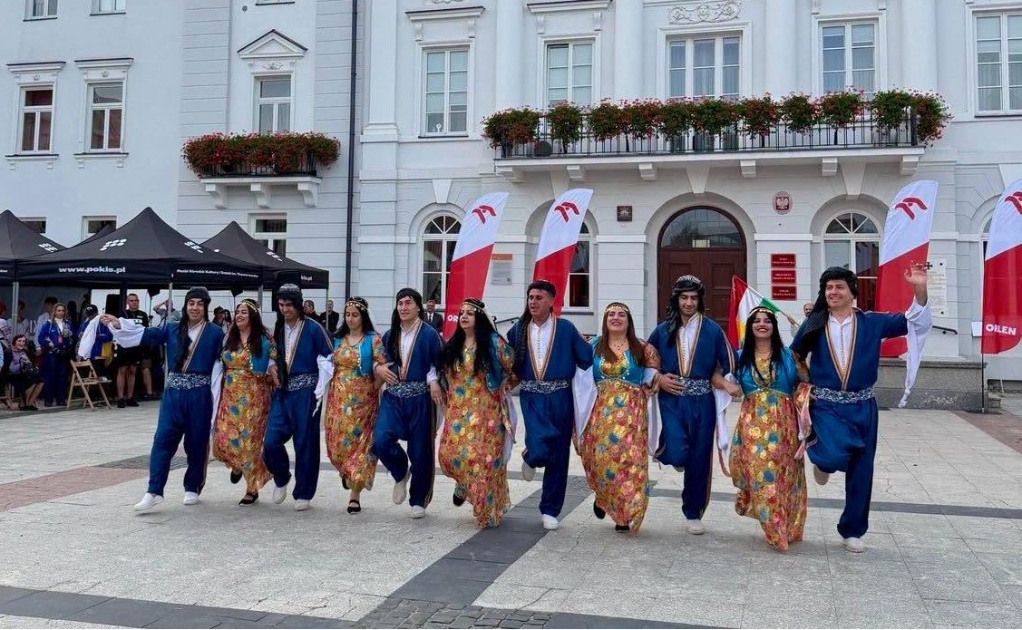 The Erbil Folk Arts Troupe during a performance at a folklore festival in Poland.