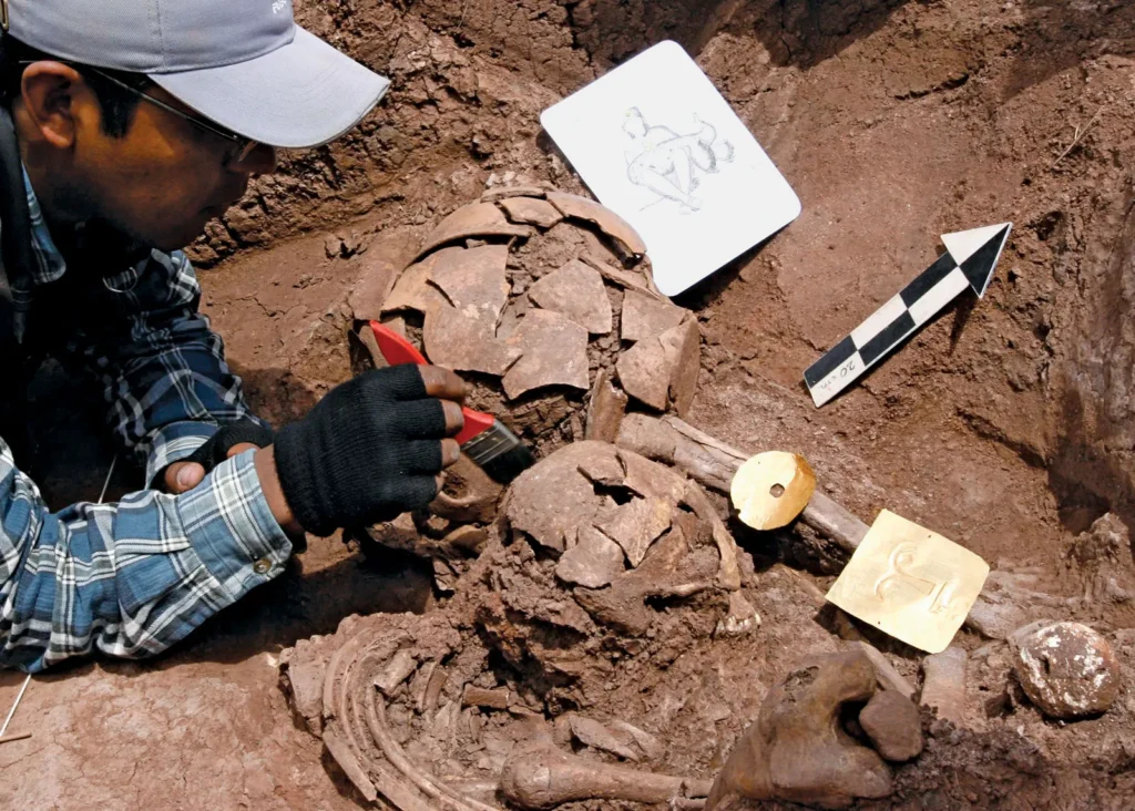 Photo of an archaeologist during an excavation