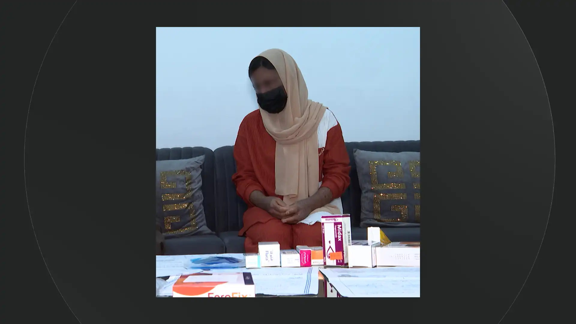 The 22-year-old, suffering from rare Xeroderma Pigmentosum, sits with medication at her Sulaymaniyah home. Her condition, now developed into cancer, requires urgent medical aid abroad as the sun’s rays threaten her vision in Iraq's harsh climate.