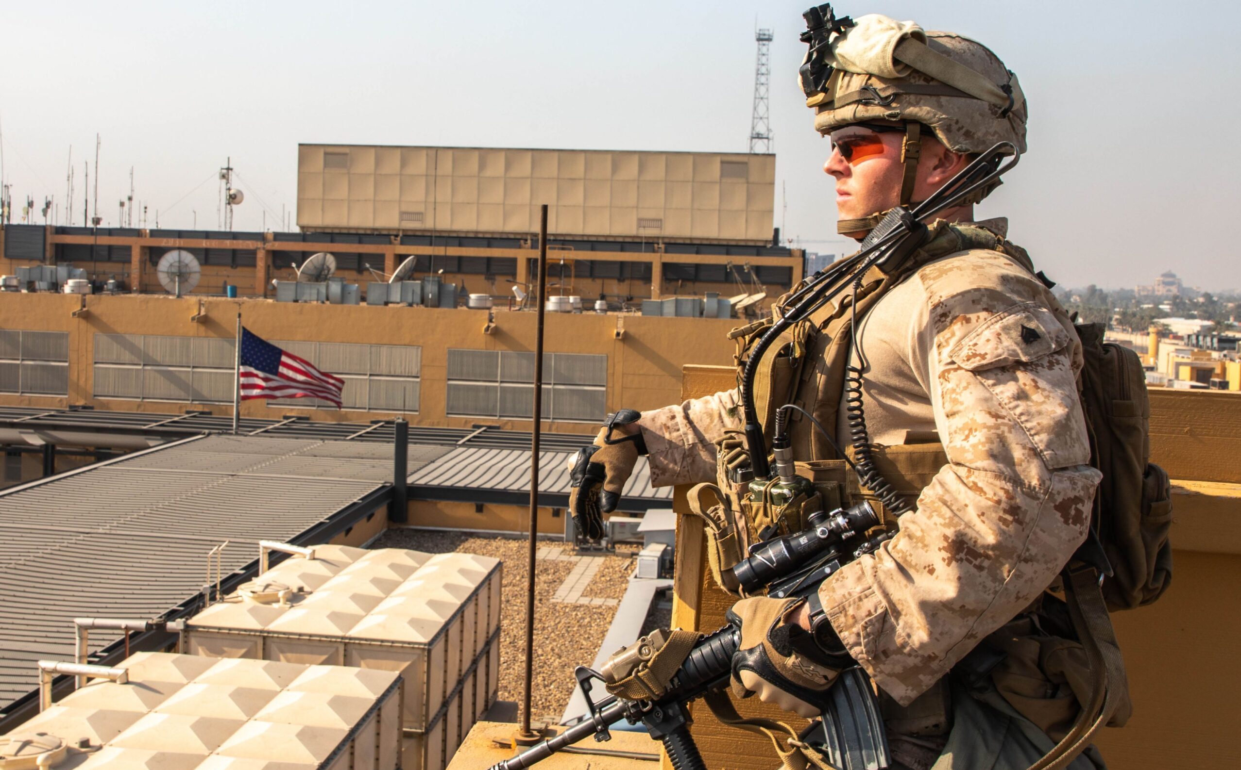 A Marine stands guard atop a building at the U.S. Embassy compound in Baghdad, Jan. 3, 2020. Photo: U.S. Department of War



