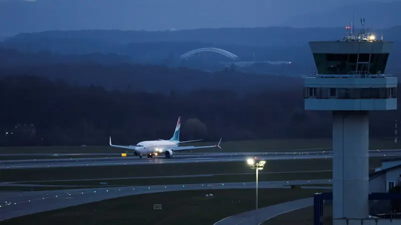 An aircraft carrying passengers evacuated from the Middle East, routed from Muscat via Hurghada, arrives at Luxembourg Airport amid the U.S.-Israeli conflict with Iran, in Luxembourg, March 5, 2026. 