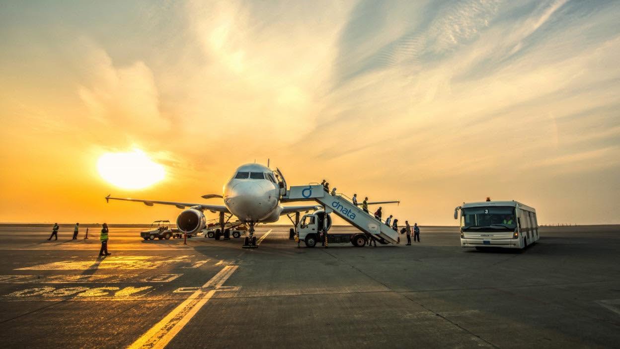 Passengers disembark from an aircraft onto the tarmac at Erbil International Airport. Erbil International Airport


