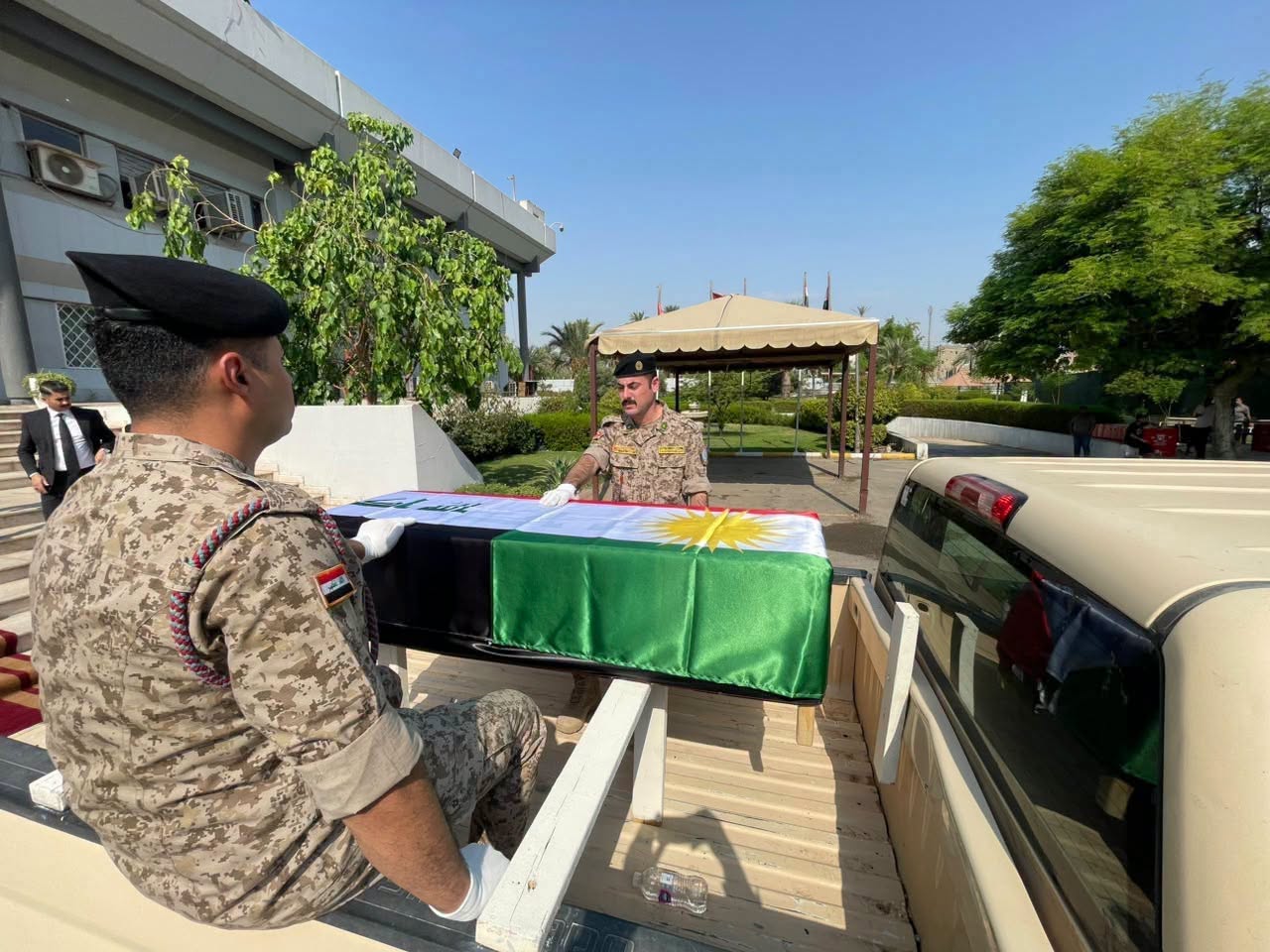 Government officials lined up to pay their respects as the remains of 153 Kurdish Anfal campaign victims departed Baghdad on September 26, 2026, during their transfer to Slemani for an official burial


