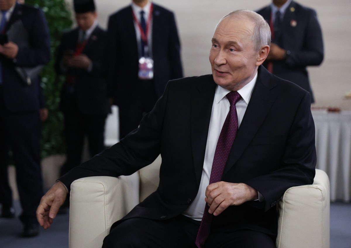 In this pool photograph distributed by the Russian state agency Sputnik, Russia's President Vladimir Putin attends the Eastern Economic Forum in Vladivostok on September 3, 2026. (Photo by Vyacheslav PROKOFYEV / POOL / AFP)