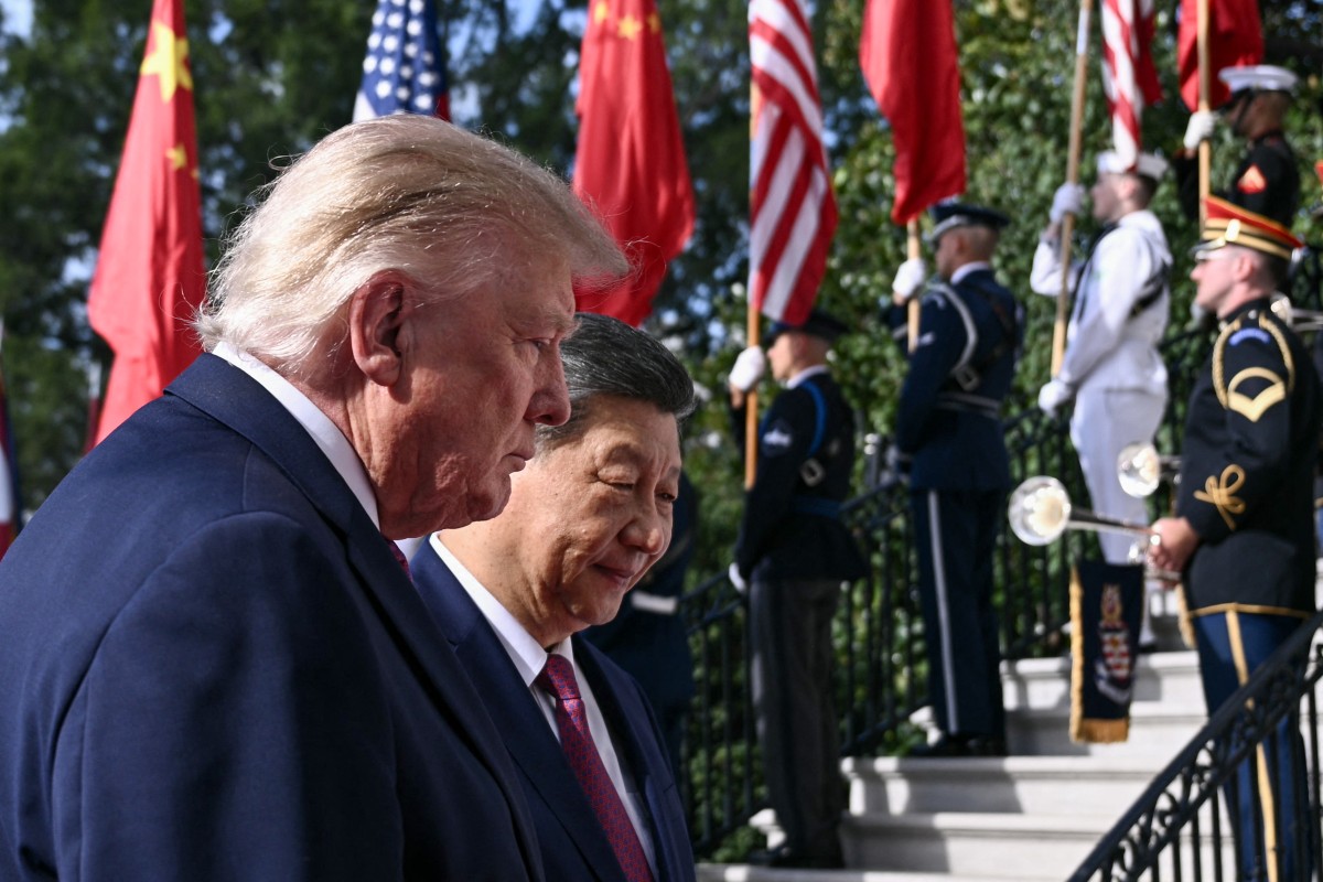 US President Donald Trump walks with China's President Xi Jinping upon Xi's arrival at the South Portico of the White House in Washington, DC, on September 24, 2026. Photo: Brendan Smialowski / AFP 

